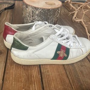 Gucci white sneakers worn with ware but still in great shape size 37